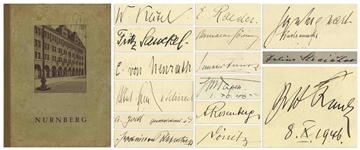 Nuremberg Book Signed by 18 Nazi War Criminals During the WWII Nuremberg Trials -- Includes Signatures by Goring, Donitz, Streicher & Speer, and Also Two ID Cards by U.S. Guard Who Acquired Signatures